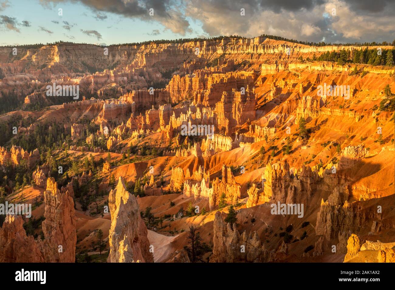 Sunrise light hits the amphitheater at the Bryce Canyon Stock Photo