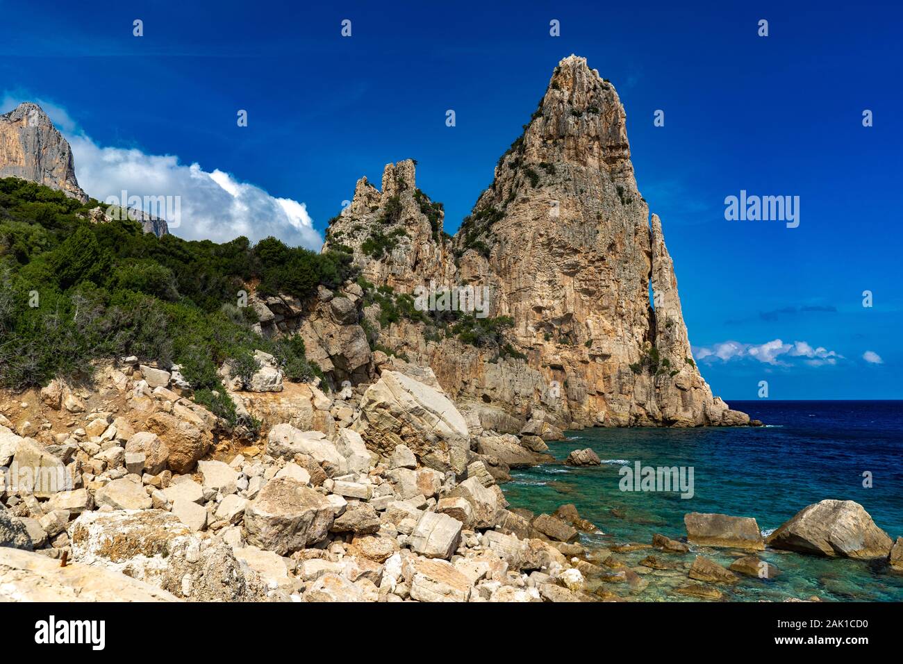 Pedra Longa in Baunei - beautiful rocky beach in Sardinia. Beautiful weather and beautiful beach in Ogliastra, Sardiniam Italy Stock Photo