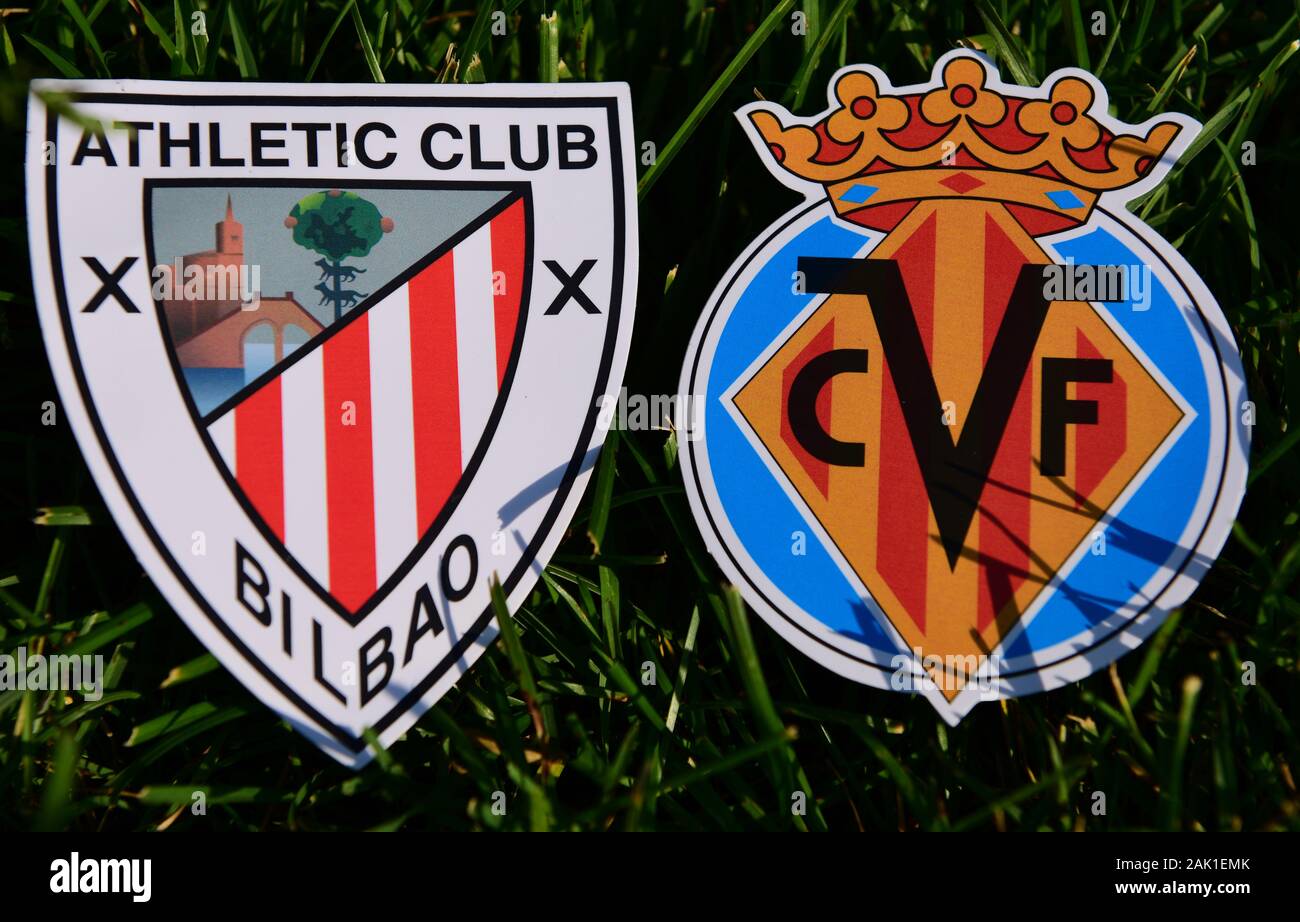September 6, 2019, Madrid, Spain. Emblems of Spanish football clubs Villarreal and Athletic Bilbao on the green grass of the lawn. Stock Photo