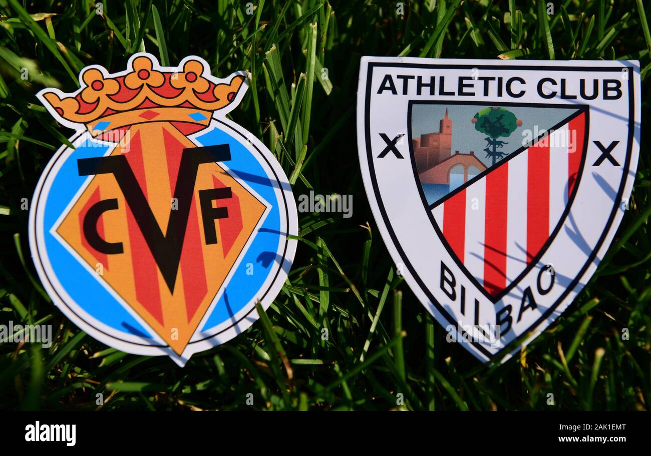September 6, 2019, Madrid, Spain. Emblems of Spanish football clubs Villarreal and Athletic Bilbao on the green grass of the lawn. Stock Photo