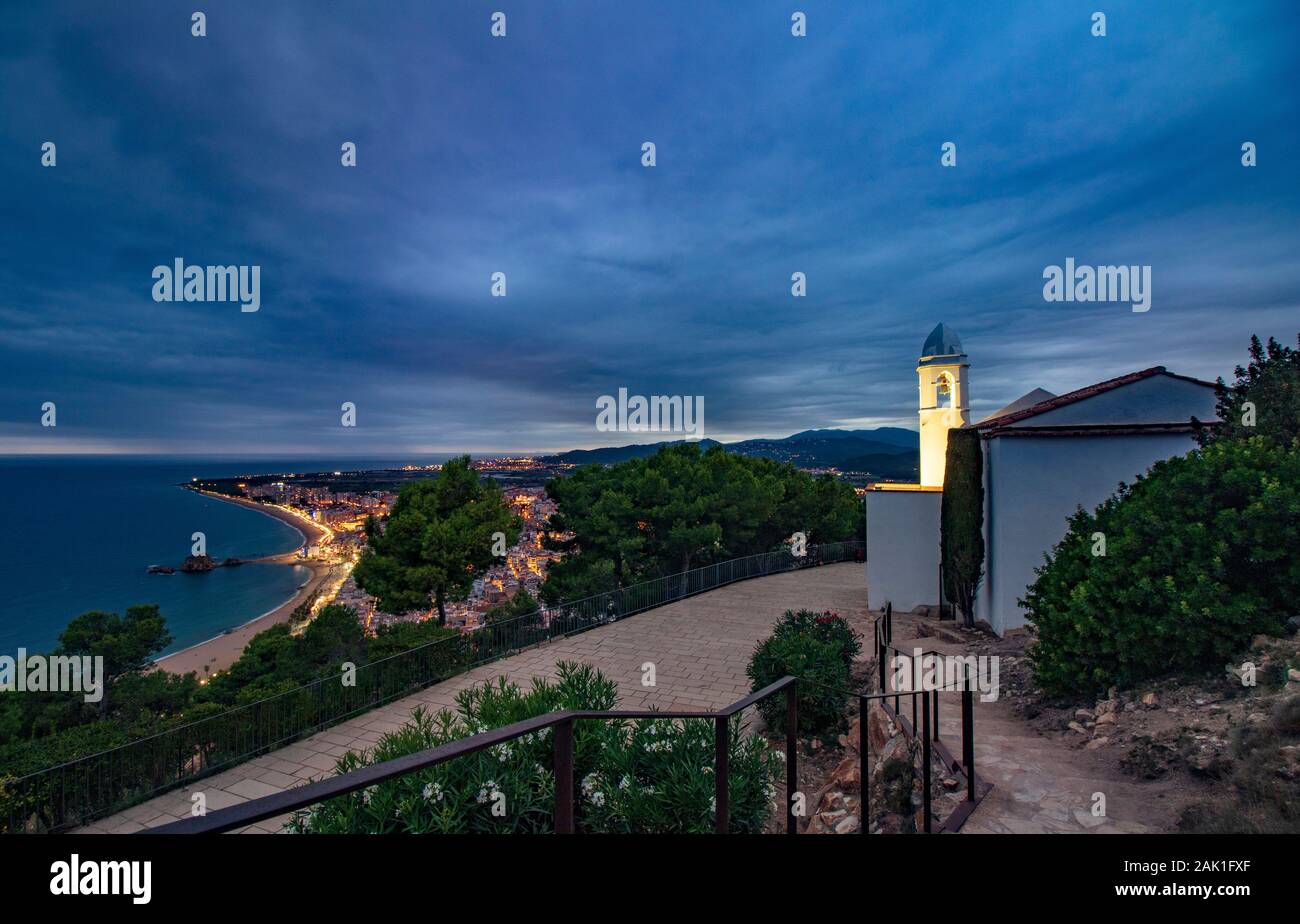 Nice village of Blanes at sunset, with a spectacular sky Stock Photo