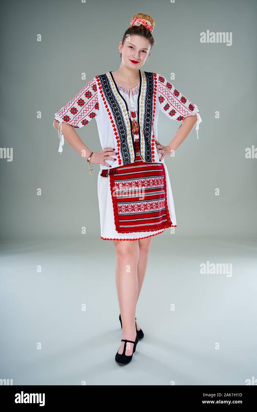 Young Romanian woman in popular costume, dancing on traditional music Stock  Photo - Alamy