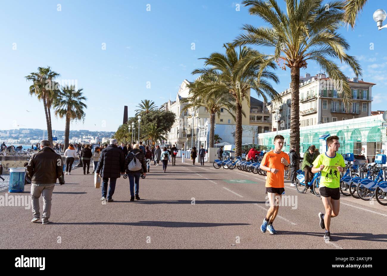 Joggers on the Prom Des Anglais Nice France Stock Photo