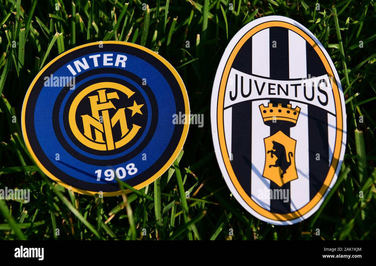 September 6, 2019, Turin, Italy. Emblems of Italian football clubs Juventus Turin and Internazionale on the green grass of the lawn. Stock Photo