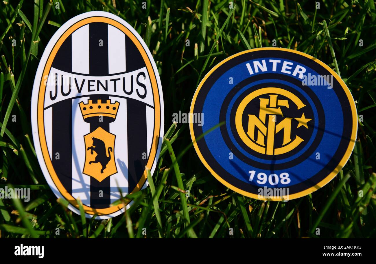 September 6, 2019, Turin, Italy. Emblems of Italian football clubs Juventus Turin and Internazionale on the green grass of the lawn. Stock Photo