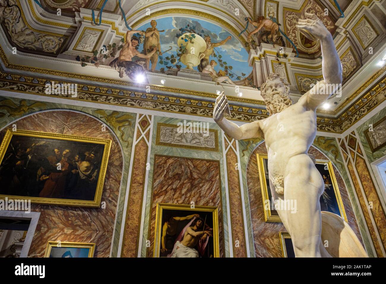 The Room of the Silenus, Dancing Satyr marble Hellenistic statue, Galleria Borghese Museum, Rome, Italy Stock Photo