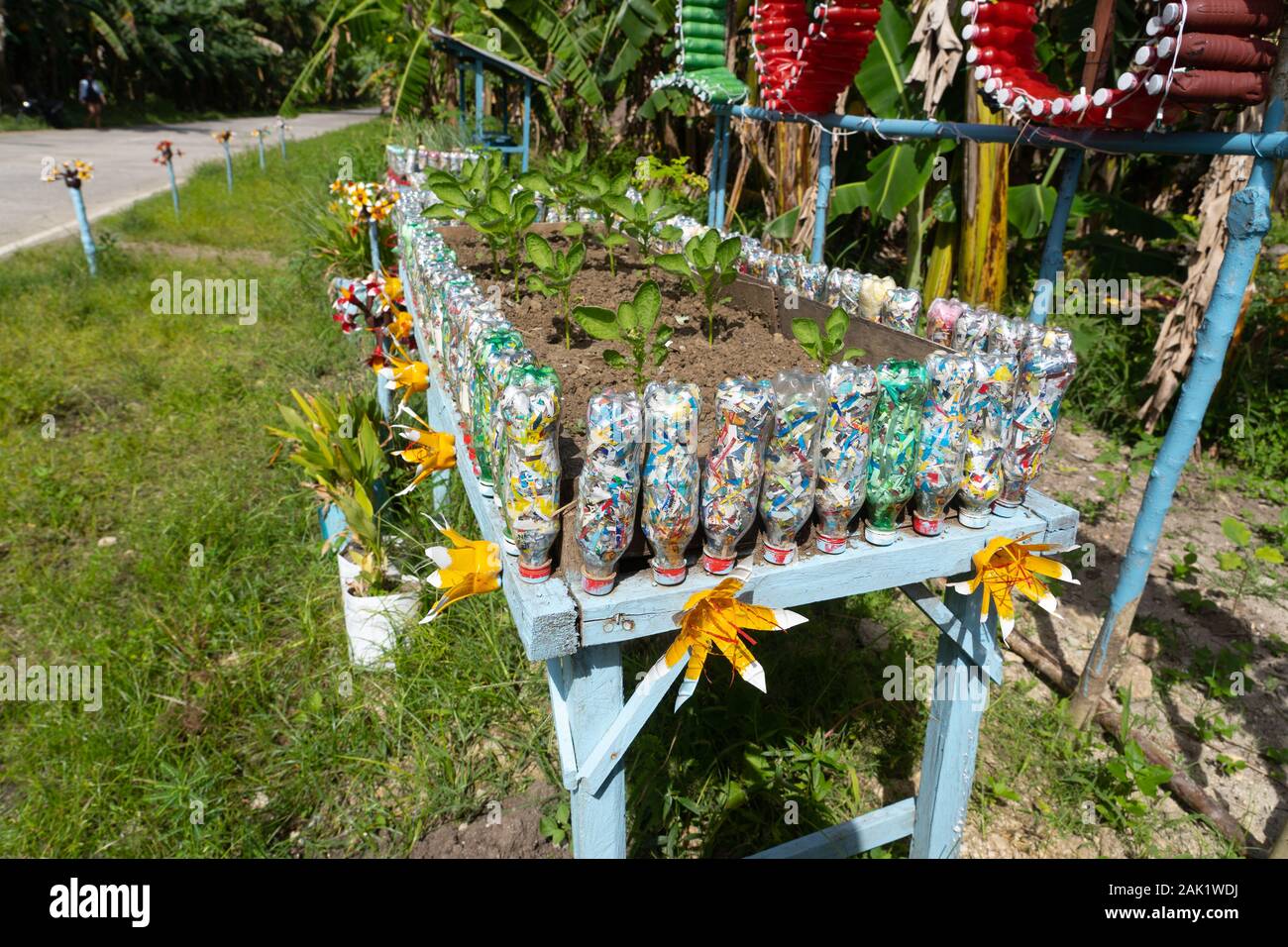 Numerous empty plastic bottles recycled and used in the construction of