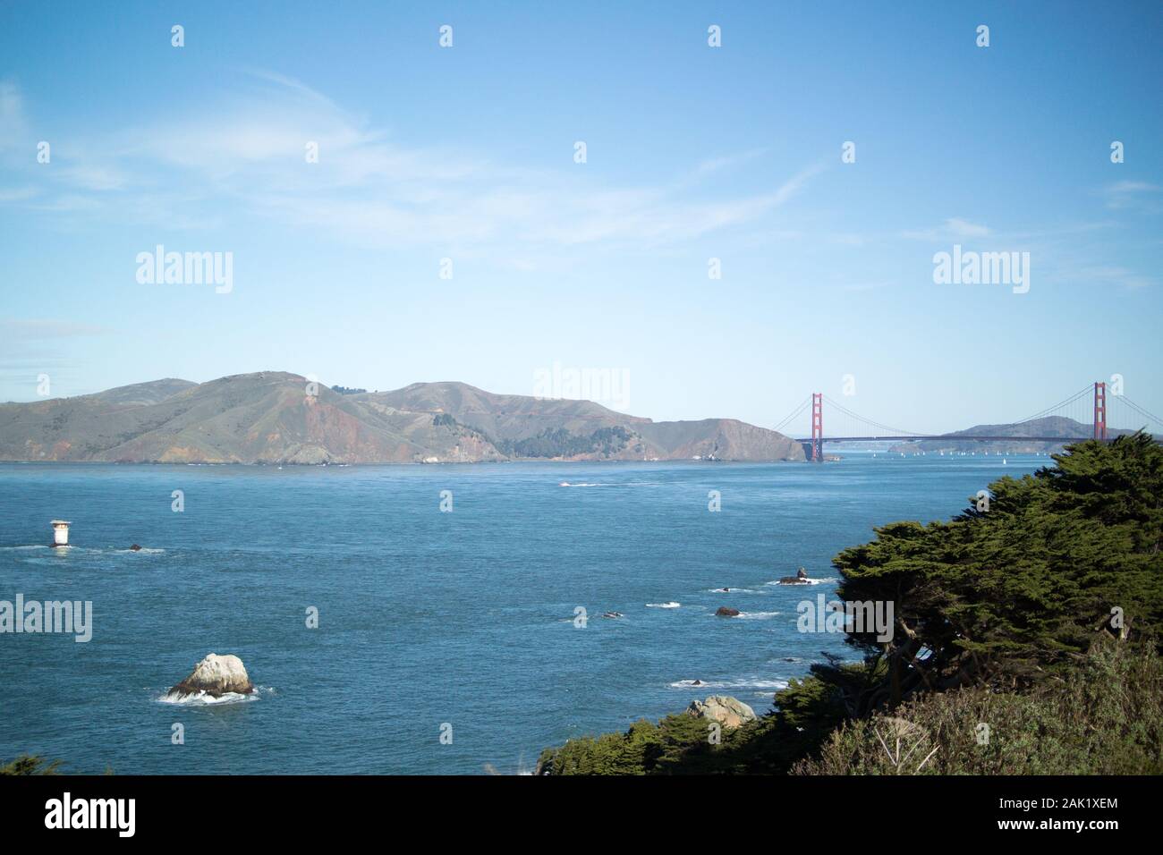View of San Francisco Bay and the Golden Gate Bridge, taken from the Golden Gate Recreation Area, west of the bridge. Stock Photo