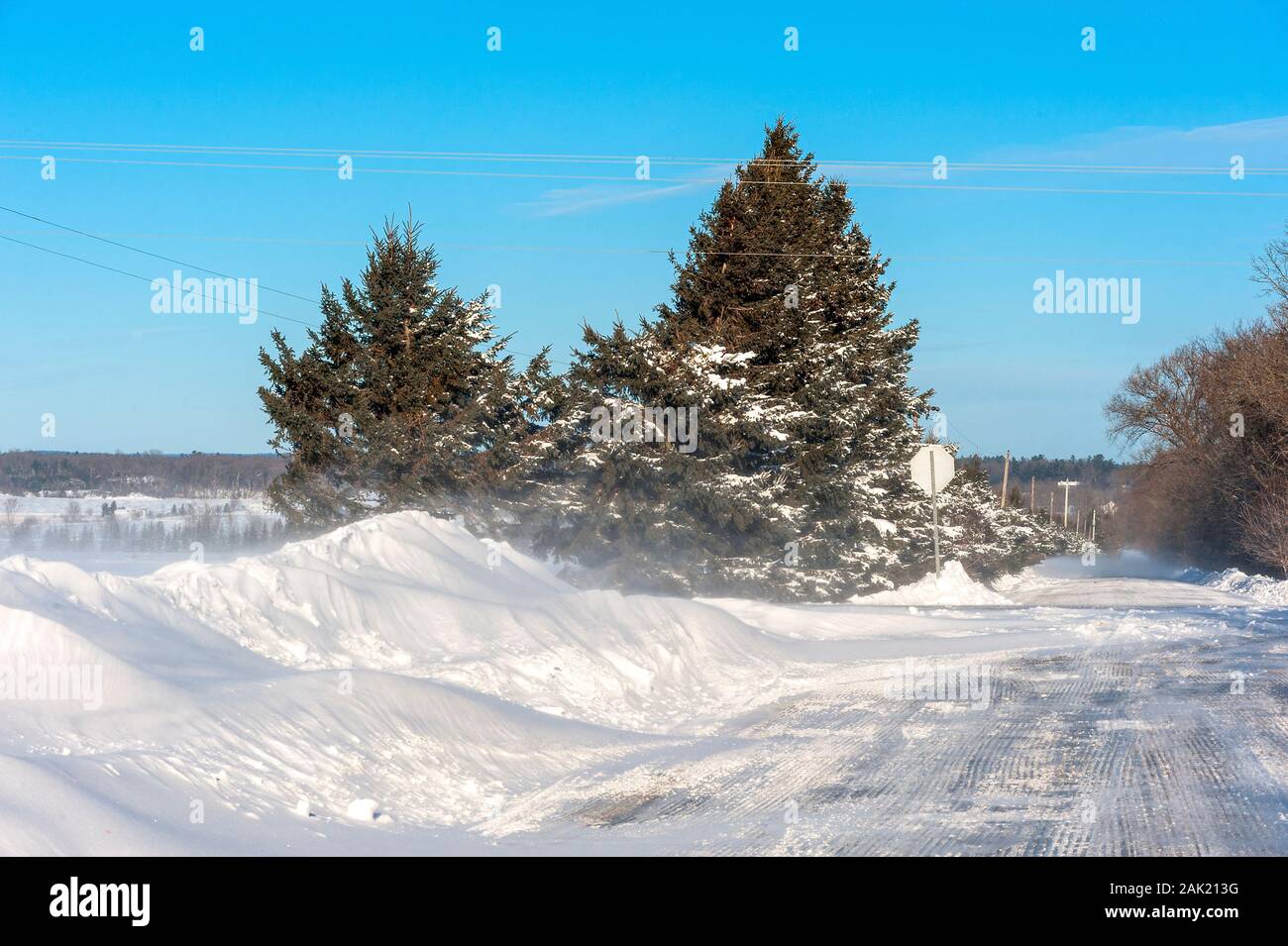 Typical Canadian country road in winter Stock Photo