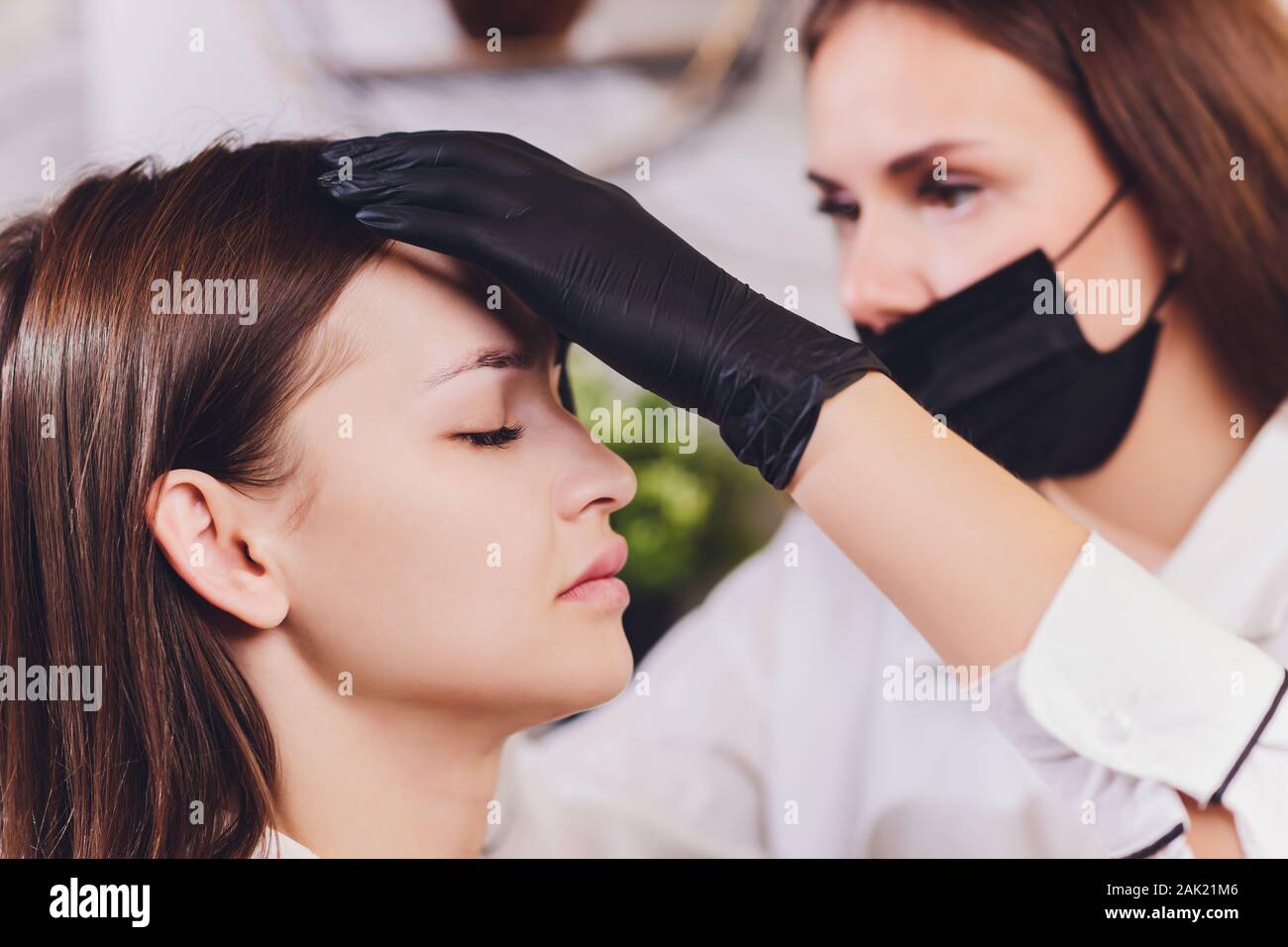beautician- makeup artist applies paint henna on previously plucked, design, trimmed eyebrows in a beauty salon in the session correction. Professiona Stock Photo - Alamy beautician- makeup artist applies paint henna on previously plucked, design, trimmed eyebrows in a beauty salon in the session correction. Professiona Stock Photo - Alamy