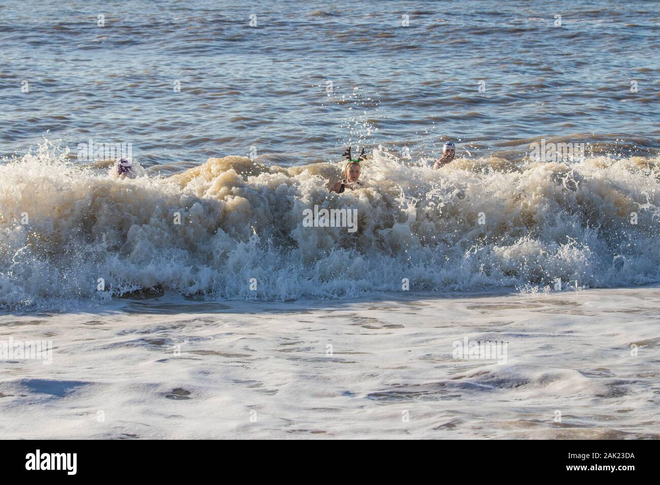 The annual Brighton Beach Christmas Day Swim 2019  The sea temperature was 12.1°C / 53.7°F Stock Photo