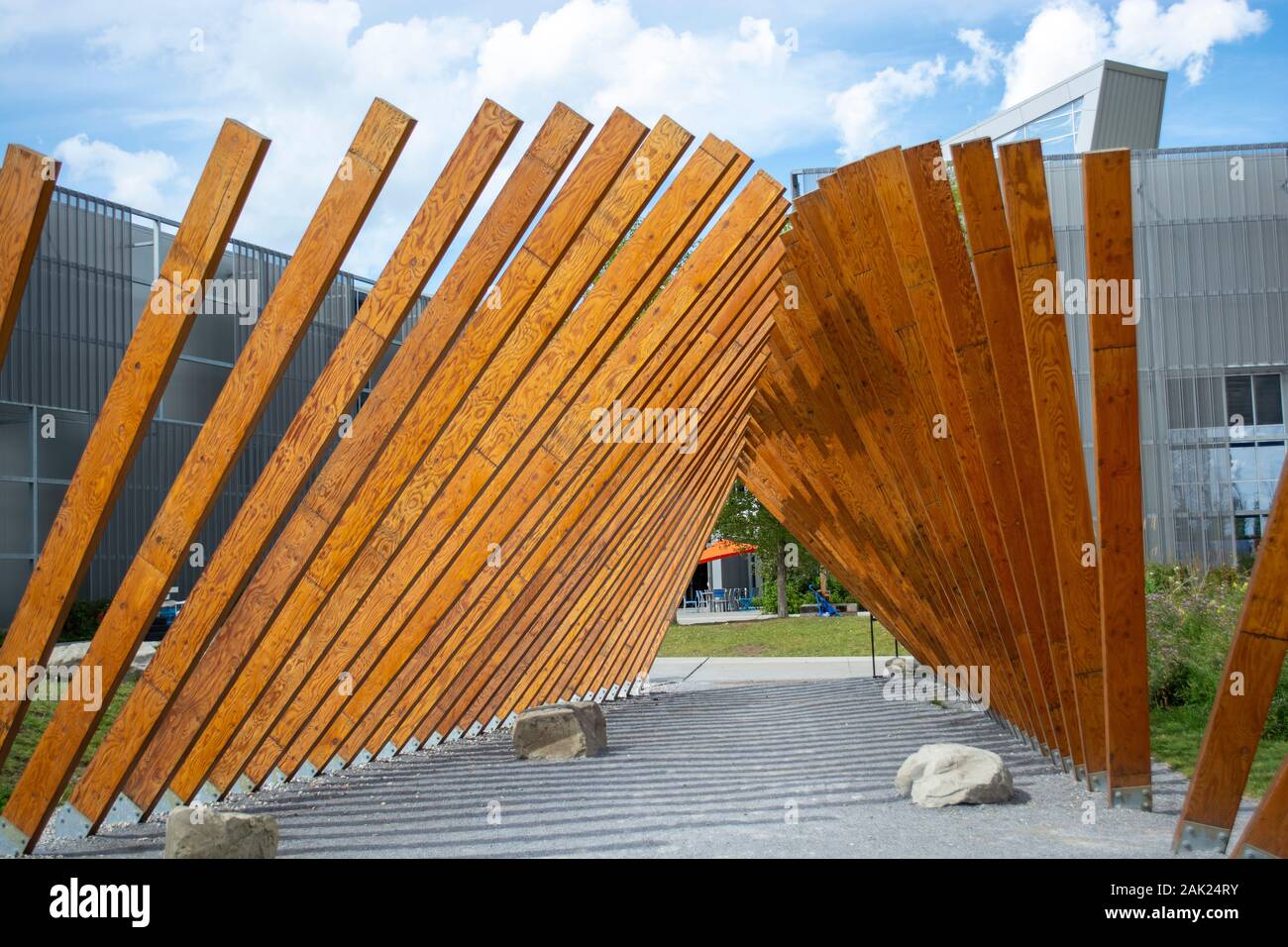 Outdoor wood public artwork installation display walk through Stock