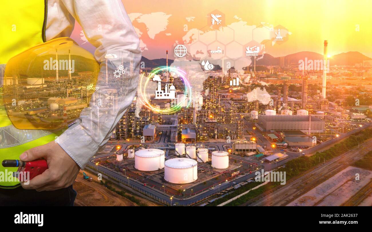 Double exposure of engineering teams is working at refinery plant as icon concept petrochemical industry. Stock Photo