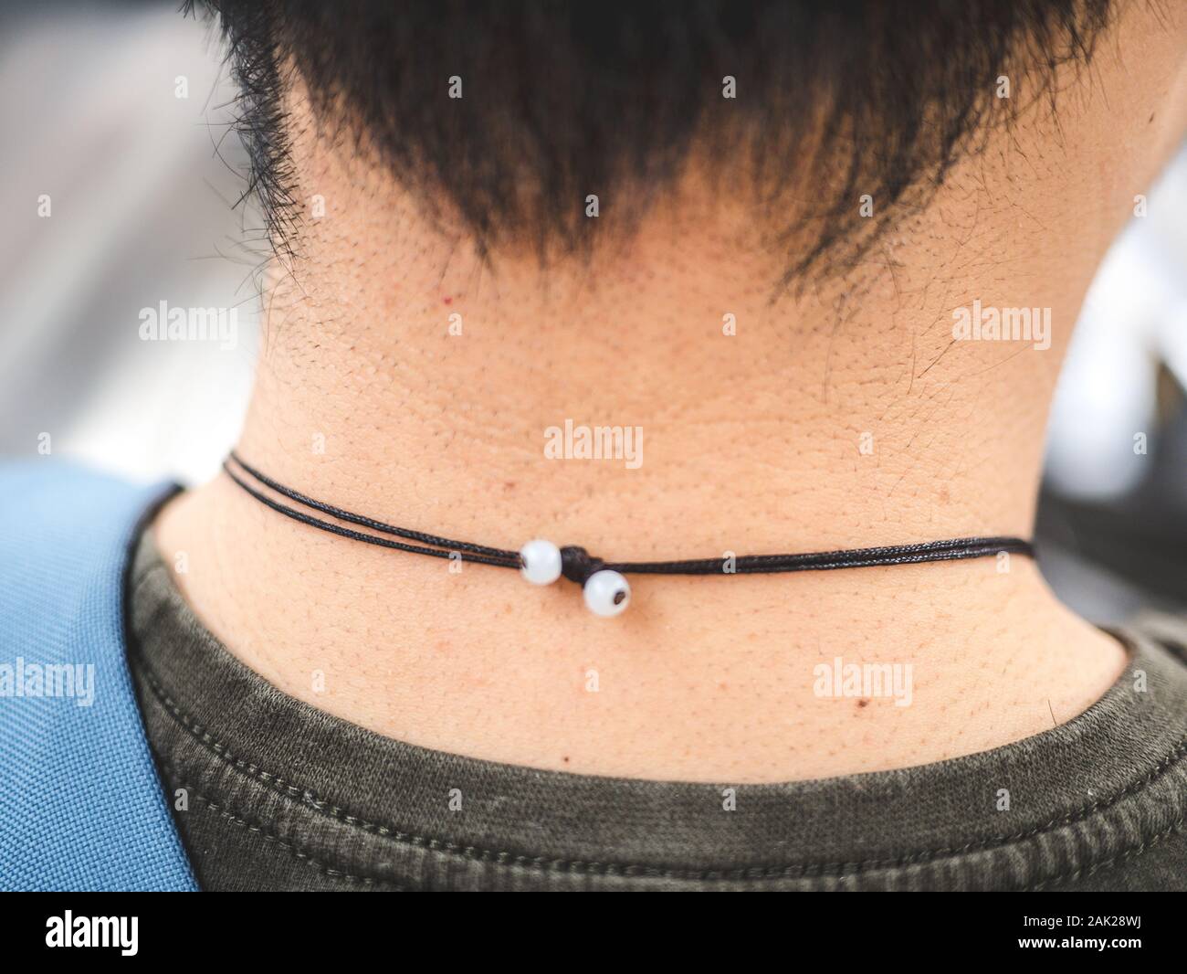 Behind of the man neck with necklace - Back of the asian men head Stock  Photo - Alamy