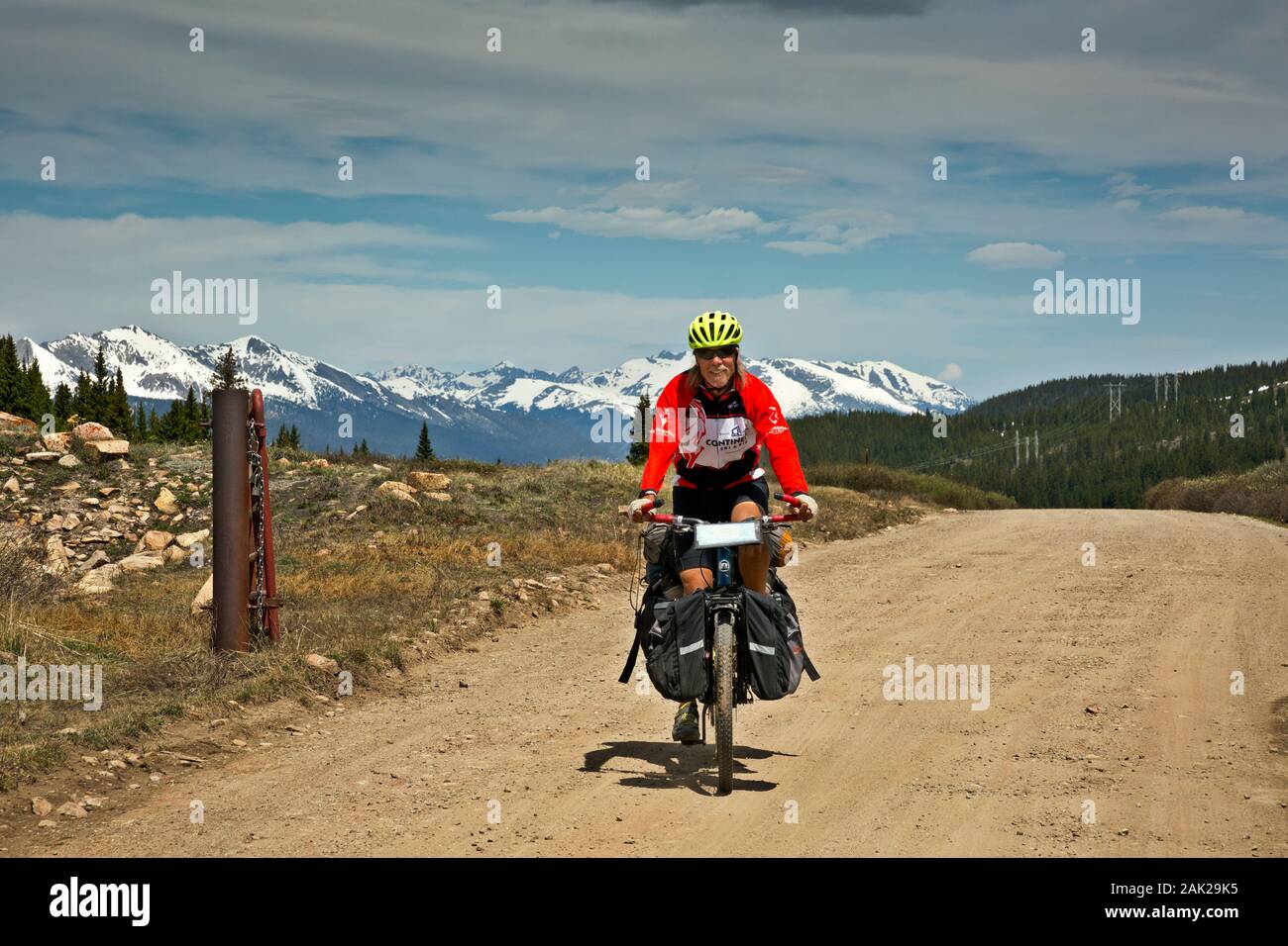 CO00193-00...COLORADO - Cyclist touring the Great Divide MOuntain Bike Route at 11,482 foot Boreas Pass on the Continental Divide above Breckenridge. Stock Photo