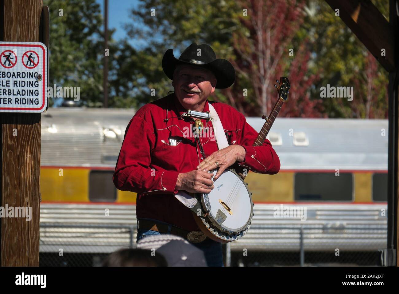 Banjo Player Cowboy Entertaining Audience at Williams Arizona, Route 66 Stock Photo