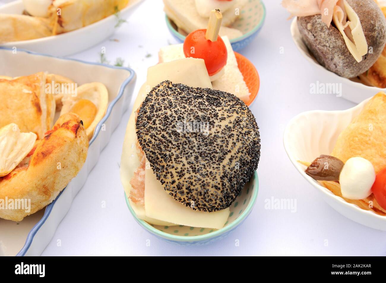 Catering sandwich with poppy seeds, cheese and ham Stock Photo Alamy