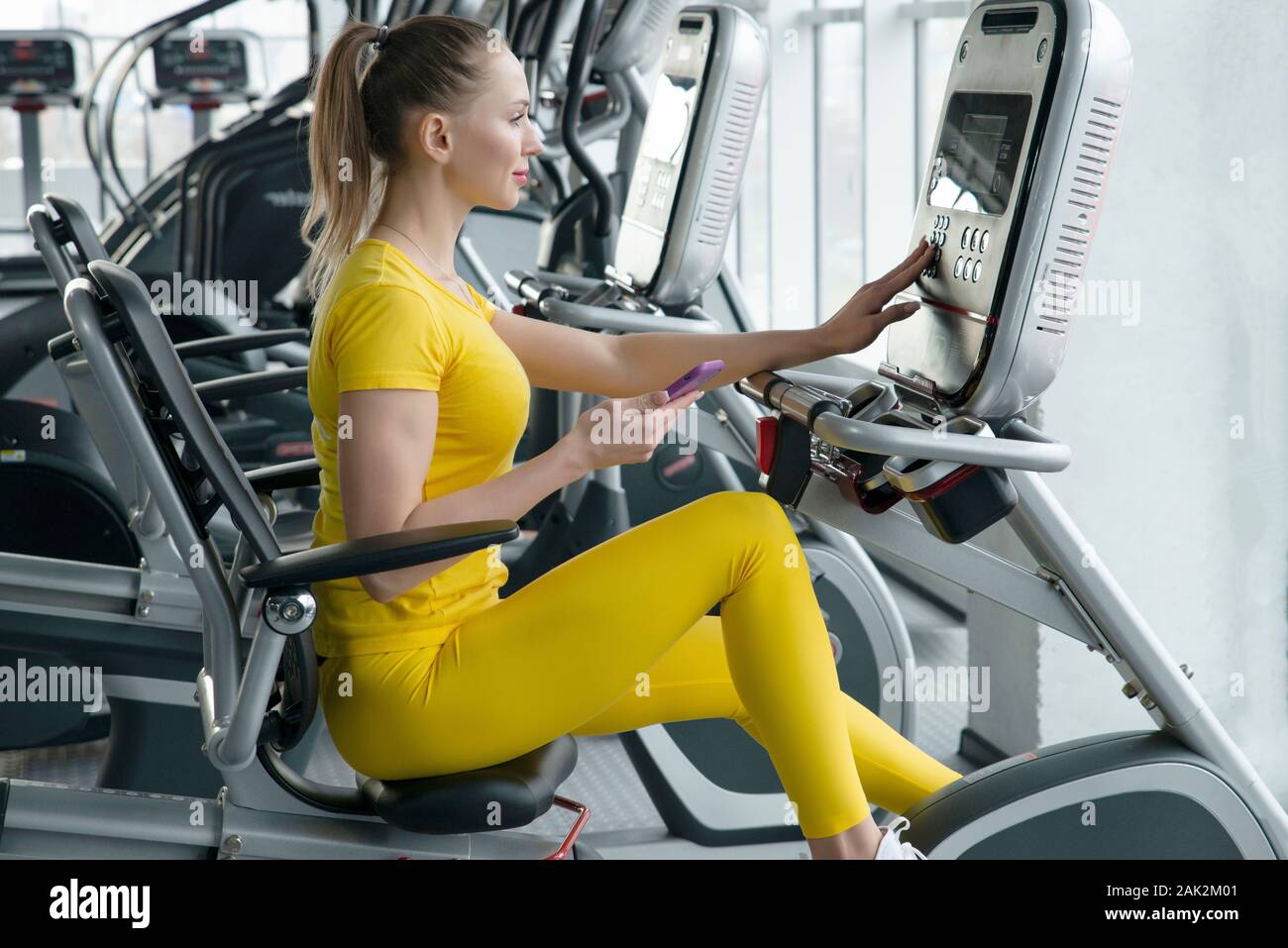 riding the bike at the gym
