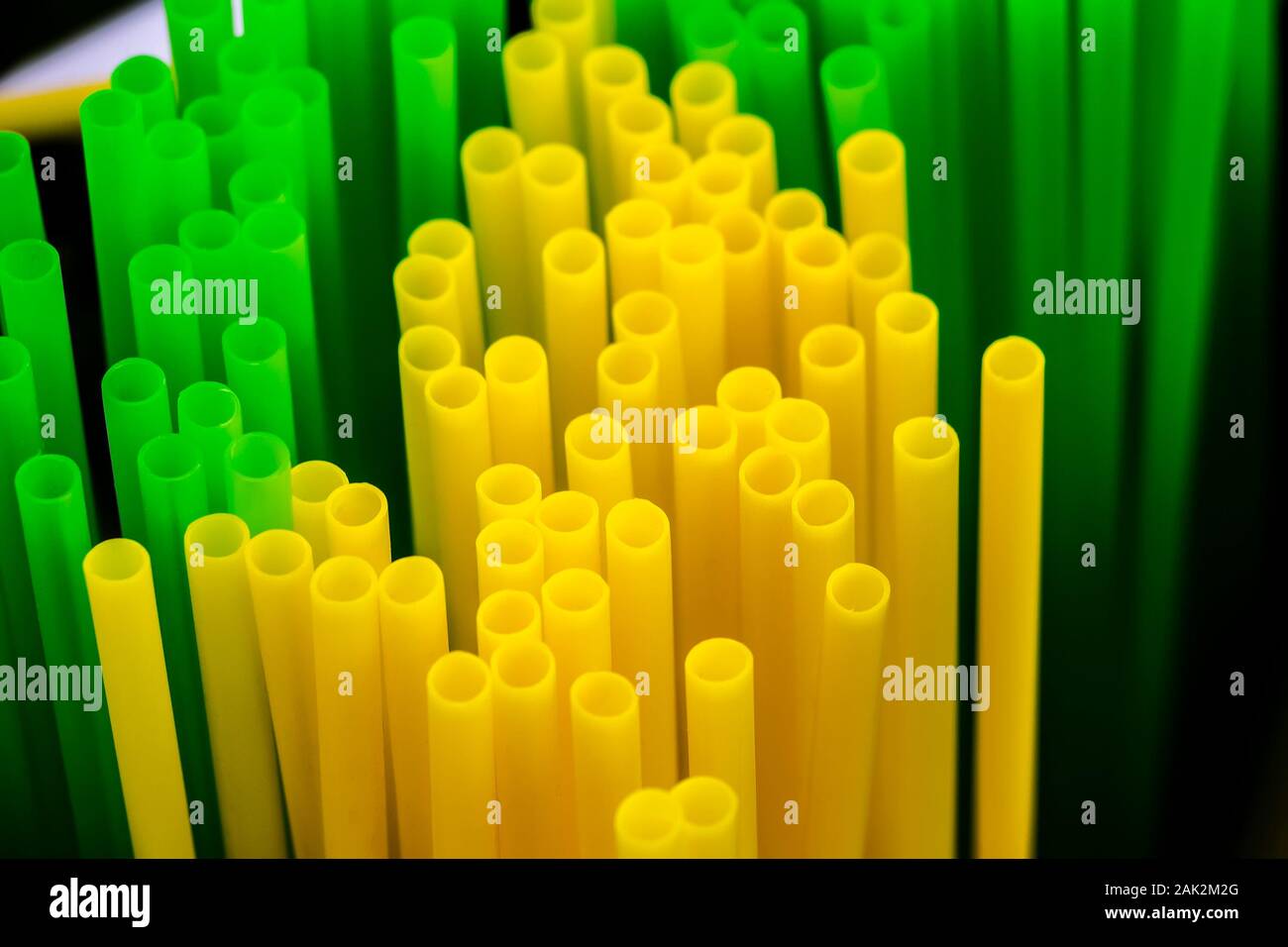 Many colored plastic tubes for drinks close-up. Stock Photo