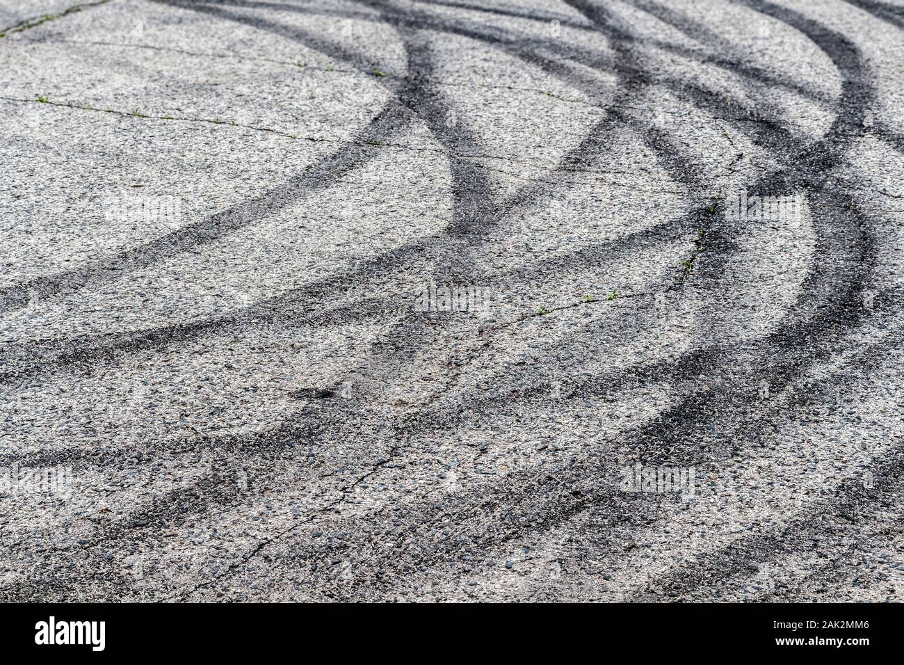 Black tracks on the pavement from a drift car. Stock Photo
