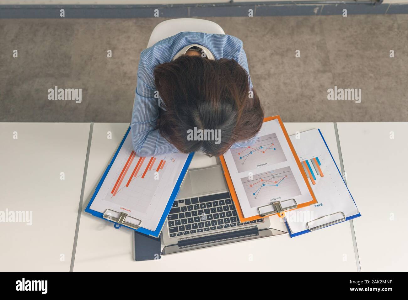 Exhausted businesswoman sleeping in the meeting room Stock Photo - Alamy