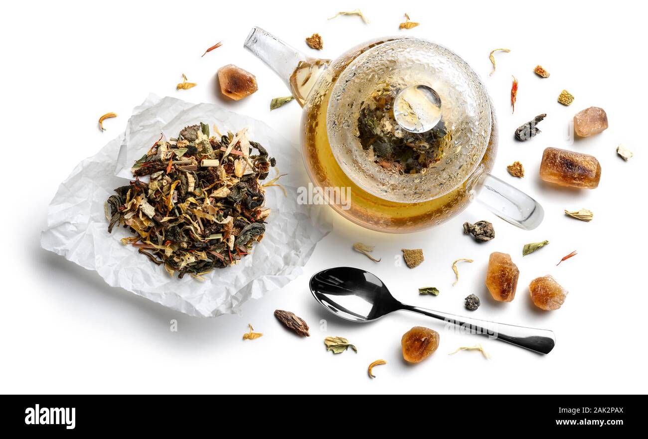 Green tea with natural aromatic additives and a teapot. Top view on ...