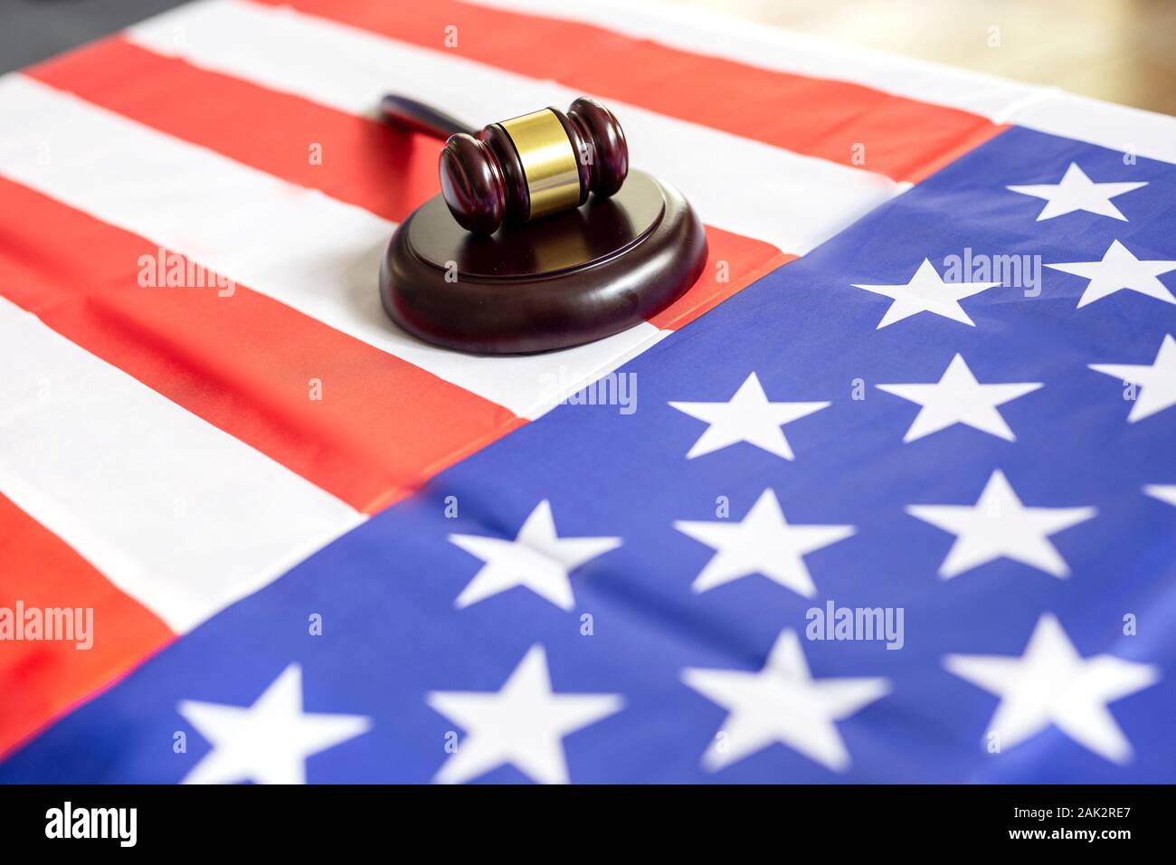 United states flag with wooden gavel on table Stock Photo