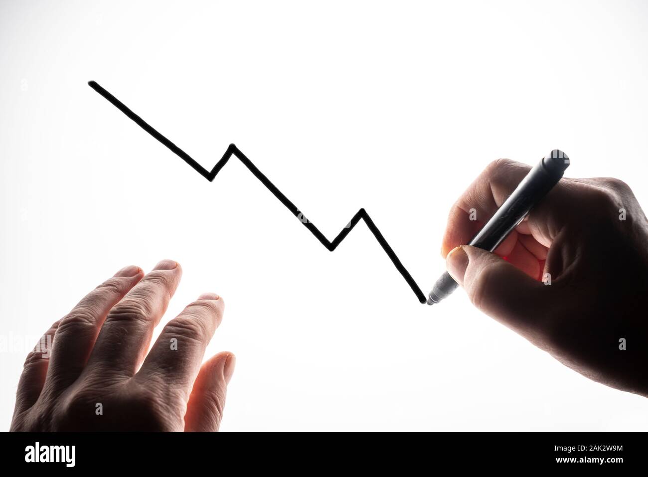 the trend graph drawn on a backlit surface Stock Photo