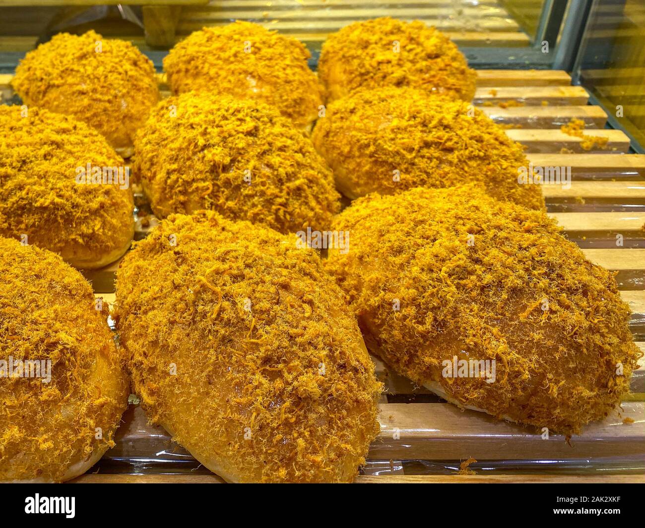 Delicious chicken meat floss bun in showcase at bakery Stock Photo Alamy
