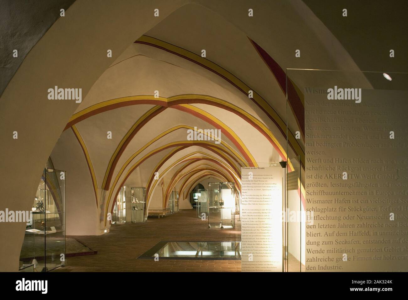 In the cellar with arches of the city hall in Wismar you can visit an exhibition with pictures about the history of the city Wismar, Mecklenburg-Weste Stock Photo