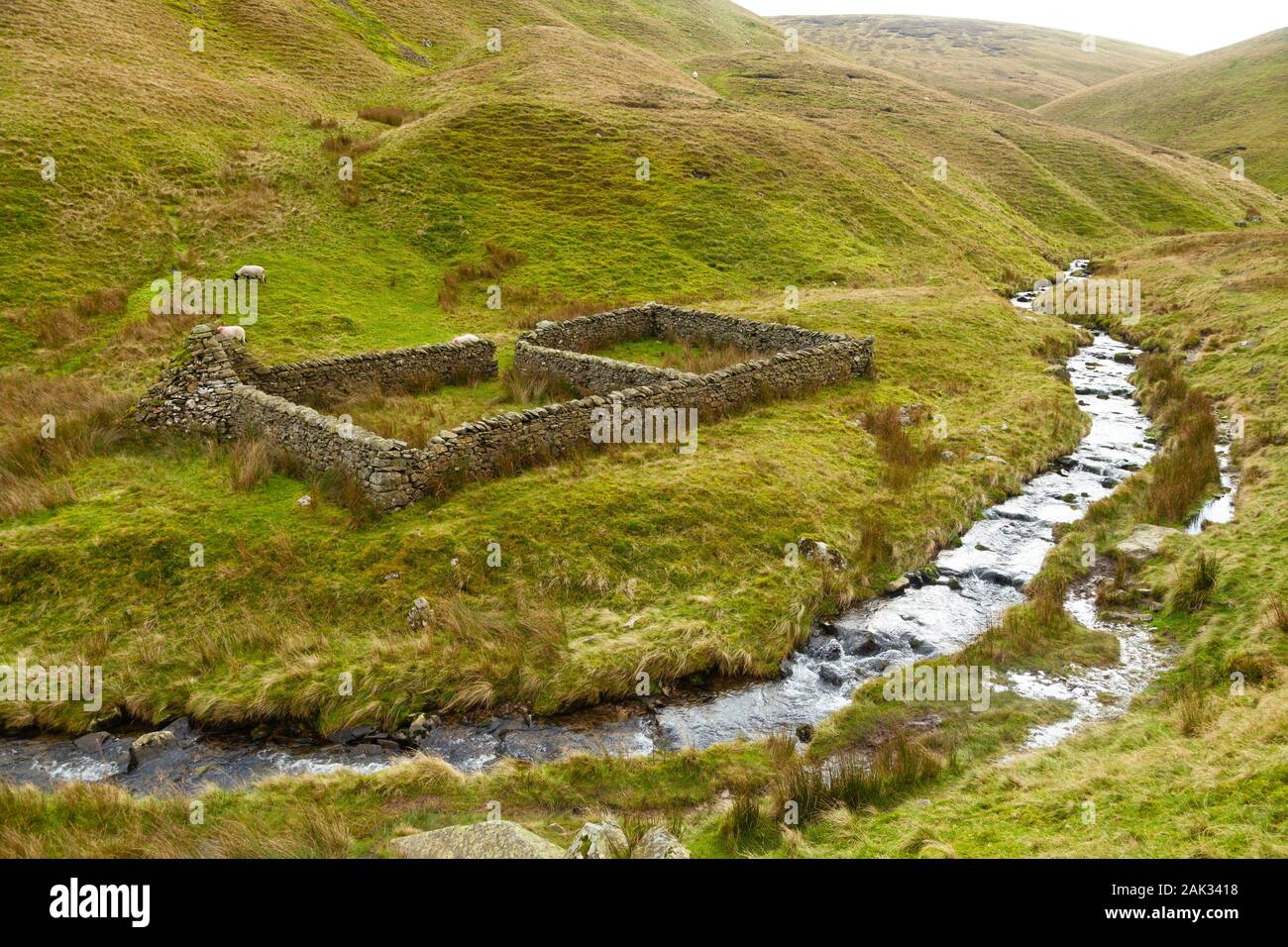 The Andy Goldsworthy sheepfold by Red Gill Beck near Cautley Spout waterfall Stock Photo