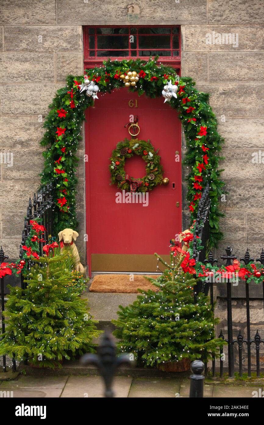 Front door decorated with Christmas decorations, South Queensferry, Scotland. Stock Photo