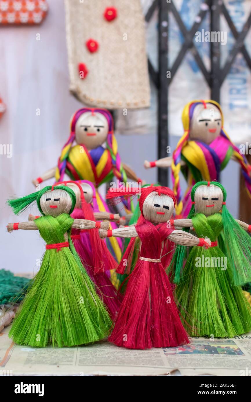 Hanging dolls on wall sale