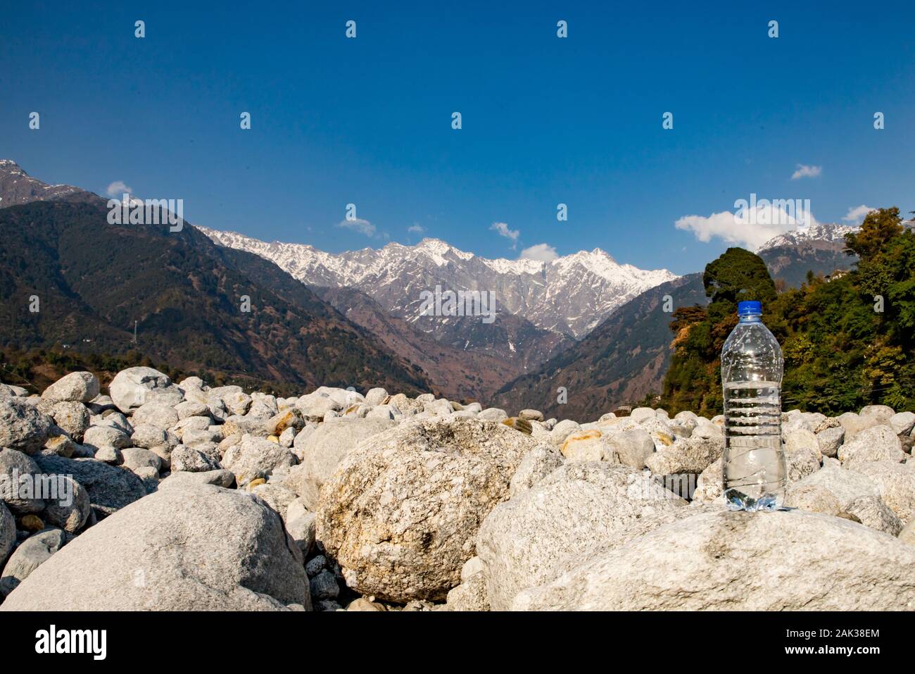 Natural Pure Water Filtration from Himalayas.Hills of Himalaya with Water Bottle .Water Purification System of Himalayas Stock Photo