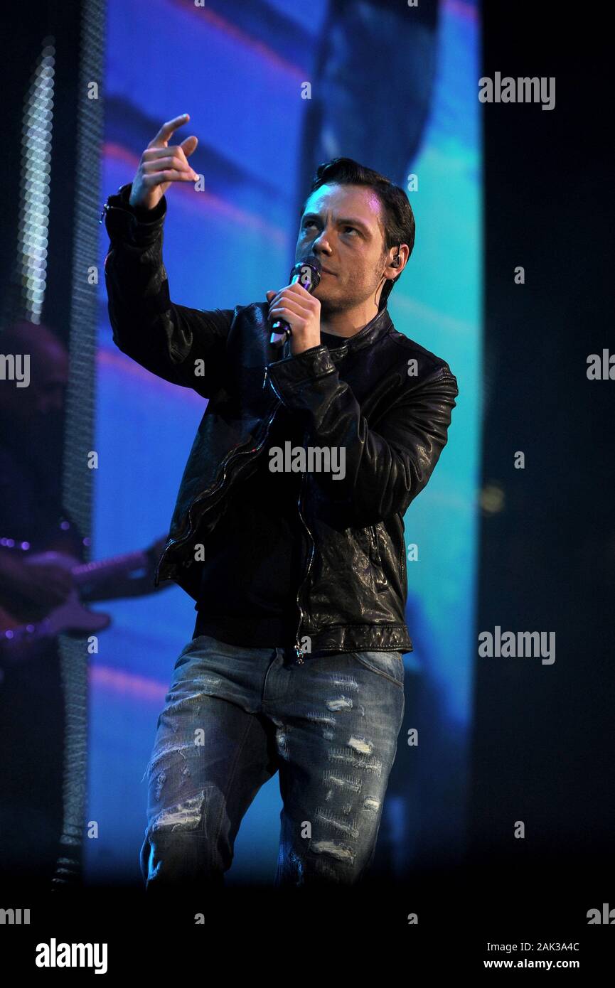 Milan Italy, 02 May 2012 ,Live concert of Tiziano Ferro at the Mediolanum  Forum of Assago: The singer Tiziano Ferro, during the show Stock Photo -  Alamy