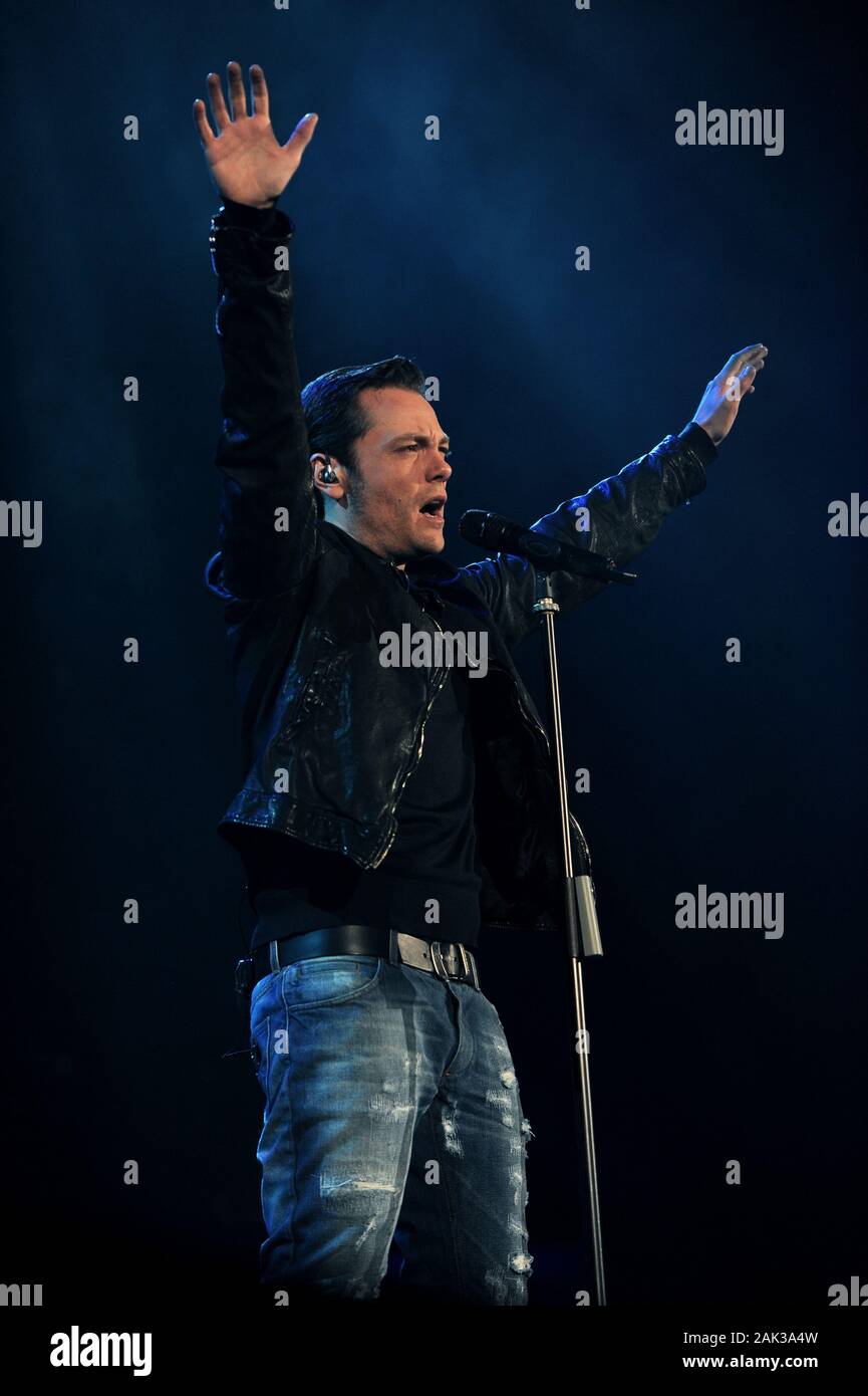 Milan Italy, 02 May 2012 ,Live concert of Tiziano Ferro at the Mediolanum  Forum of Assago: The singer Tiziano Ferro, during the show Stock Photo -  Alamy