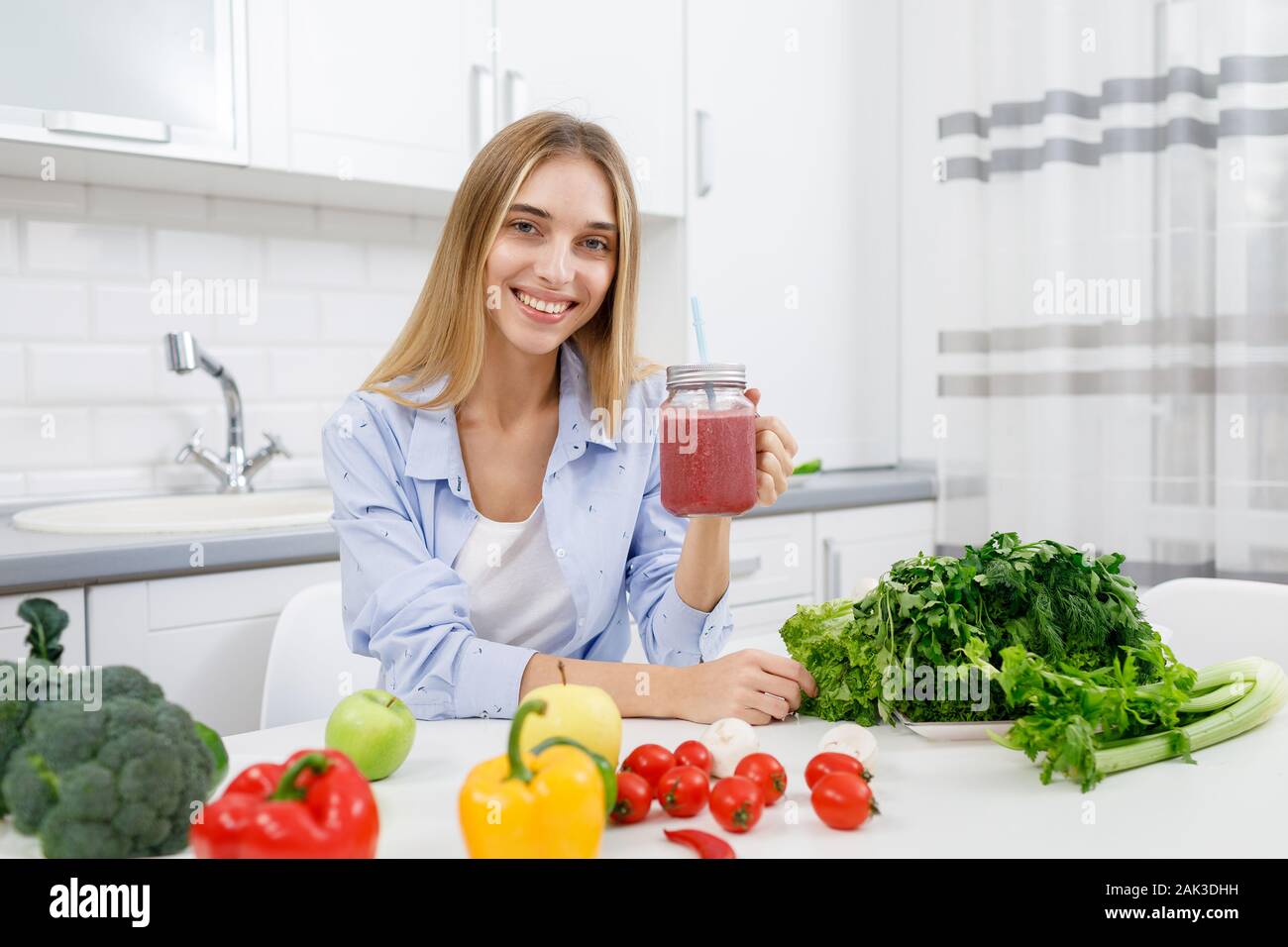A Beautiful Blonde's Healthy A Green Lifestyle Stock Photo