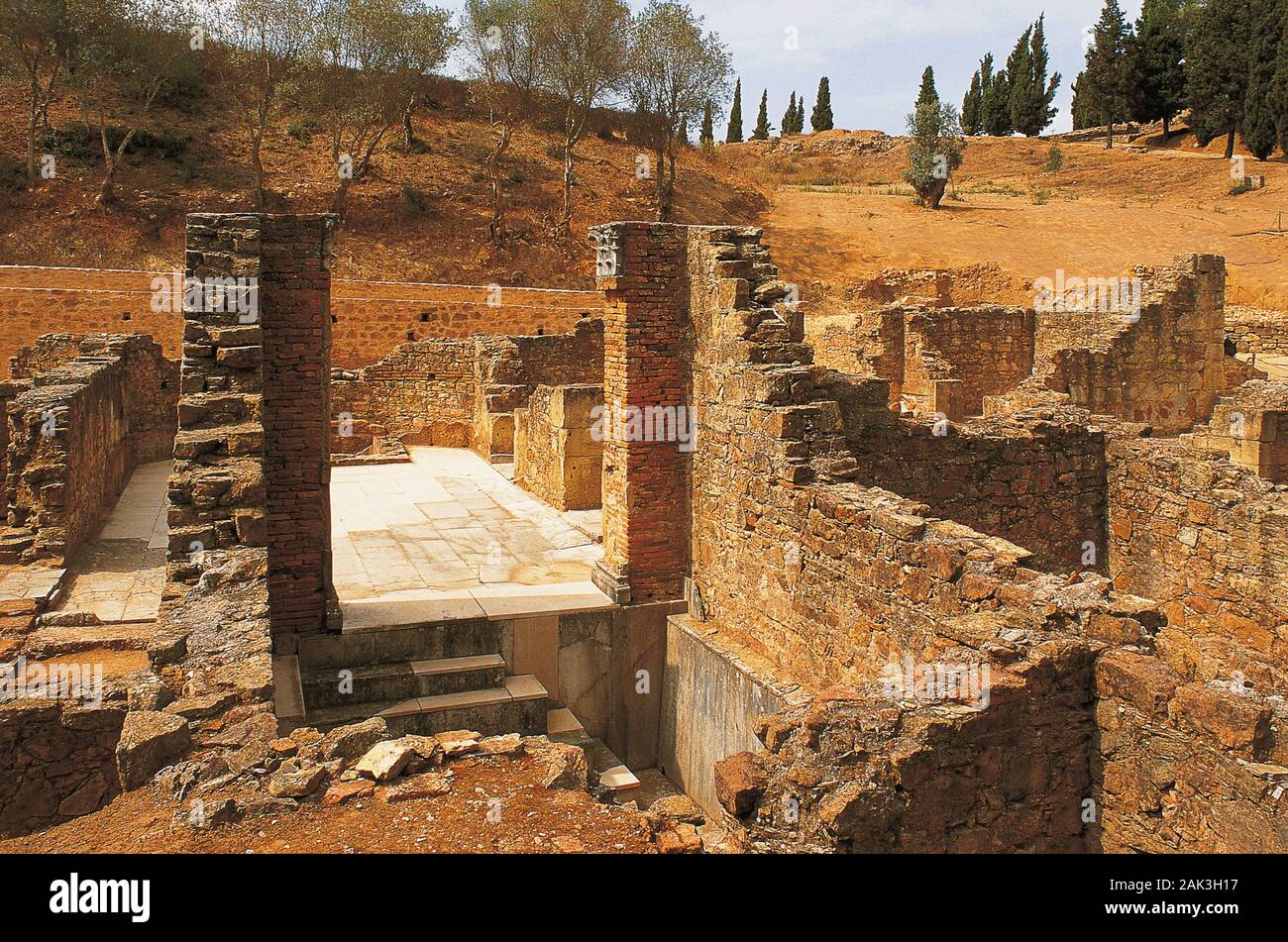 In this picture parts of the Roman can be seen in Mirobriga near the city of Santiago Do Cacem. The ruin of the temple of the Venus and the Äskulap as Stock Photo