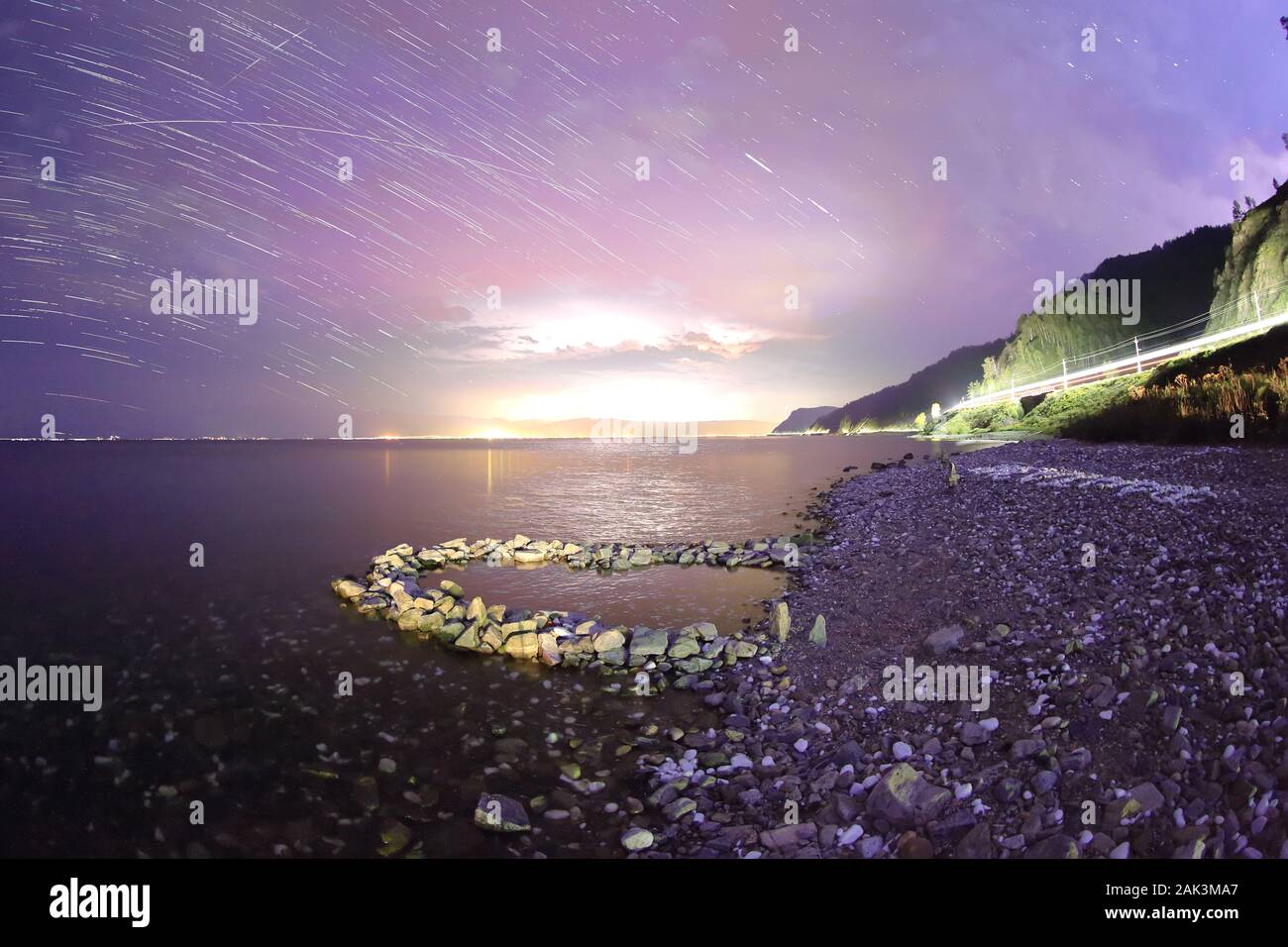 Starry Night over the lake Baikal, Republic of Buryatia, Russia Stock Photo