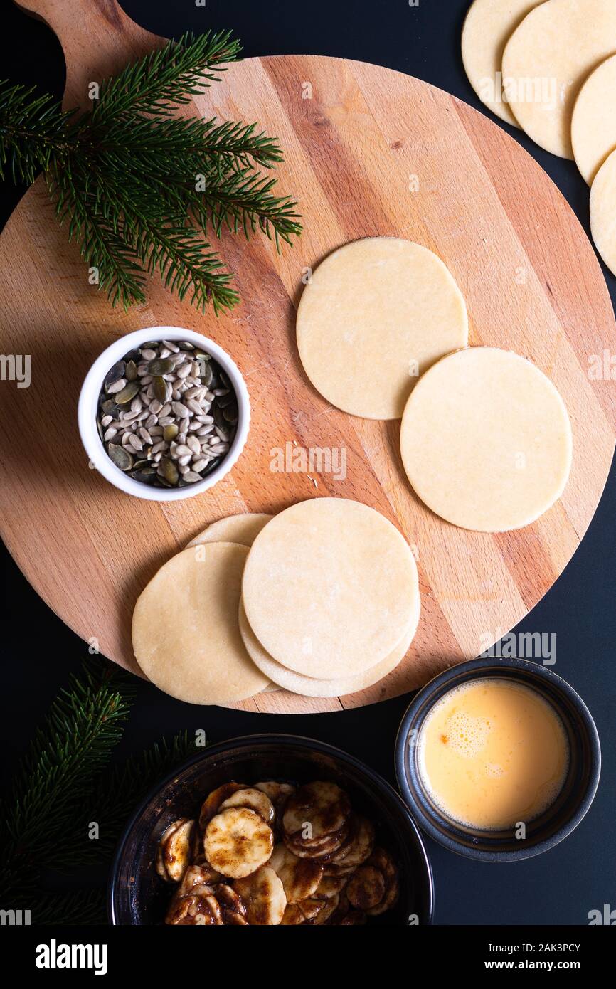 Food concept processing to make Homemade Banana foster hand pie on