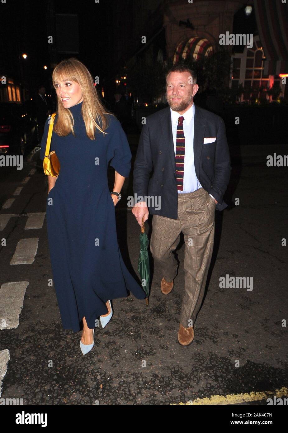 Guy Ritchie and wife Jacqui Ainsley leave Harrys Bar in Mayfair after