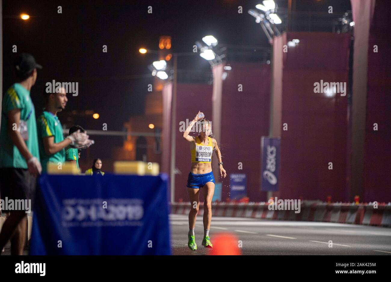 Refreshment for Cecilia NORRBOM (SWE/DNF), overwhelmed with water final marathon of women, on September 27, 2019 World Athletics Championships 2019 in Doha/Qatar, from September 27. - 10.10.2019. Â | usage worldwide Stock Photo