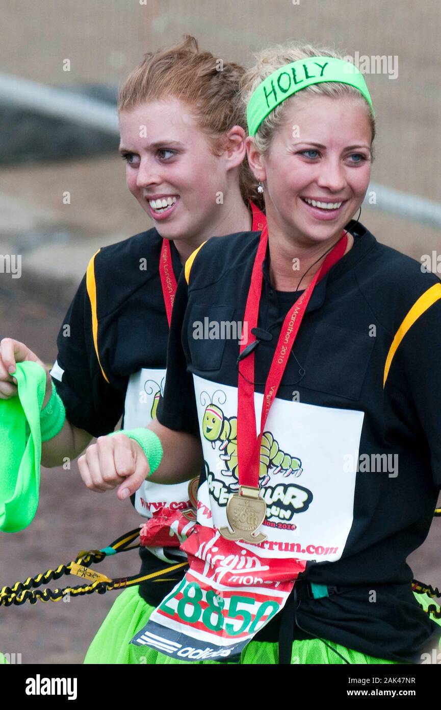 Princess Beatrice and Holly Branson celebrate as they complete the London Marathon in 2010. Stock Photo