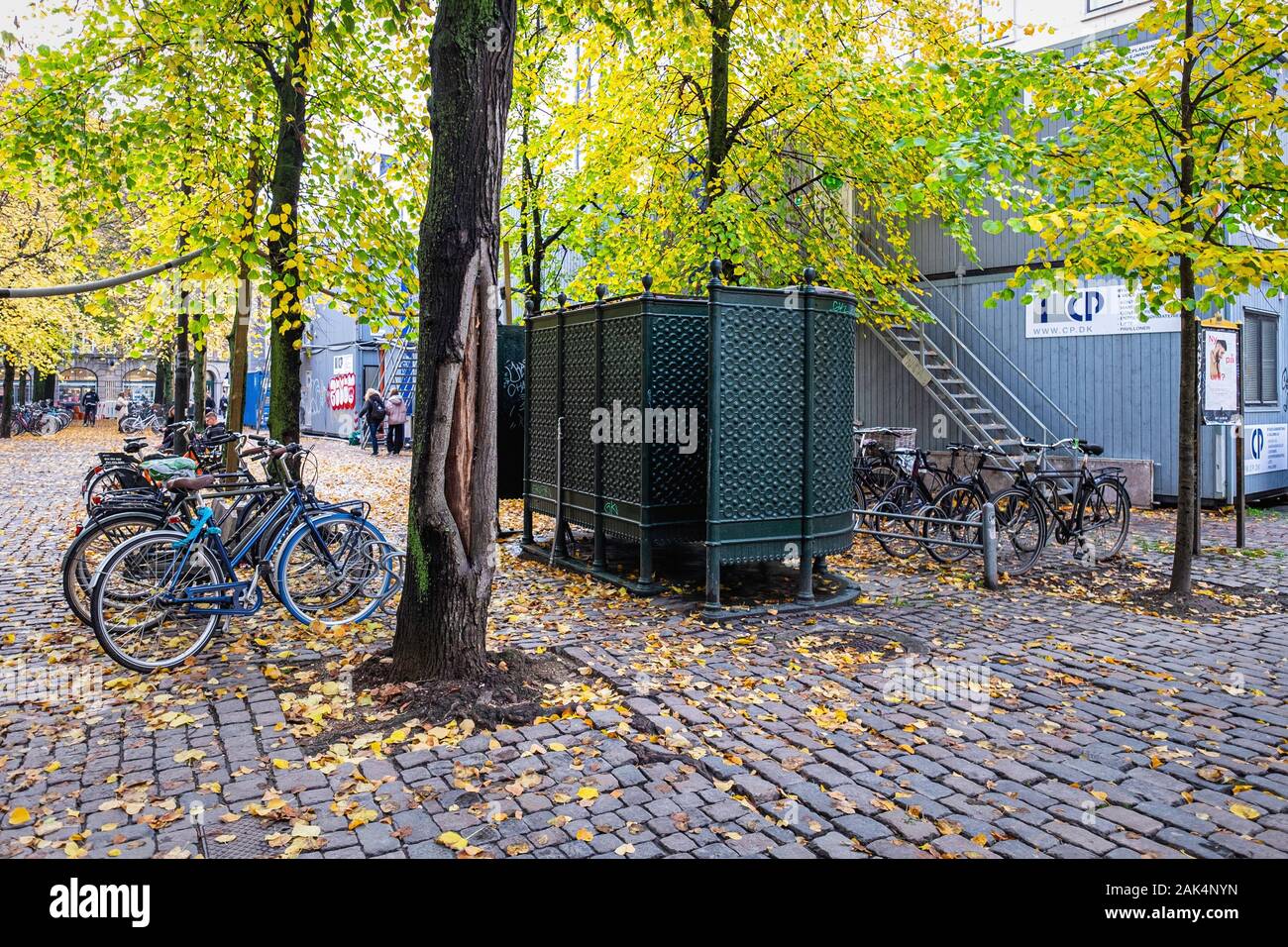 Decorative public toilets & autumn foliage on Nicolaj Plads, Copenhagen. Stock Photo
