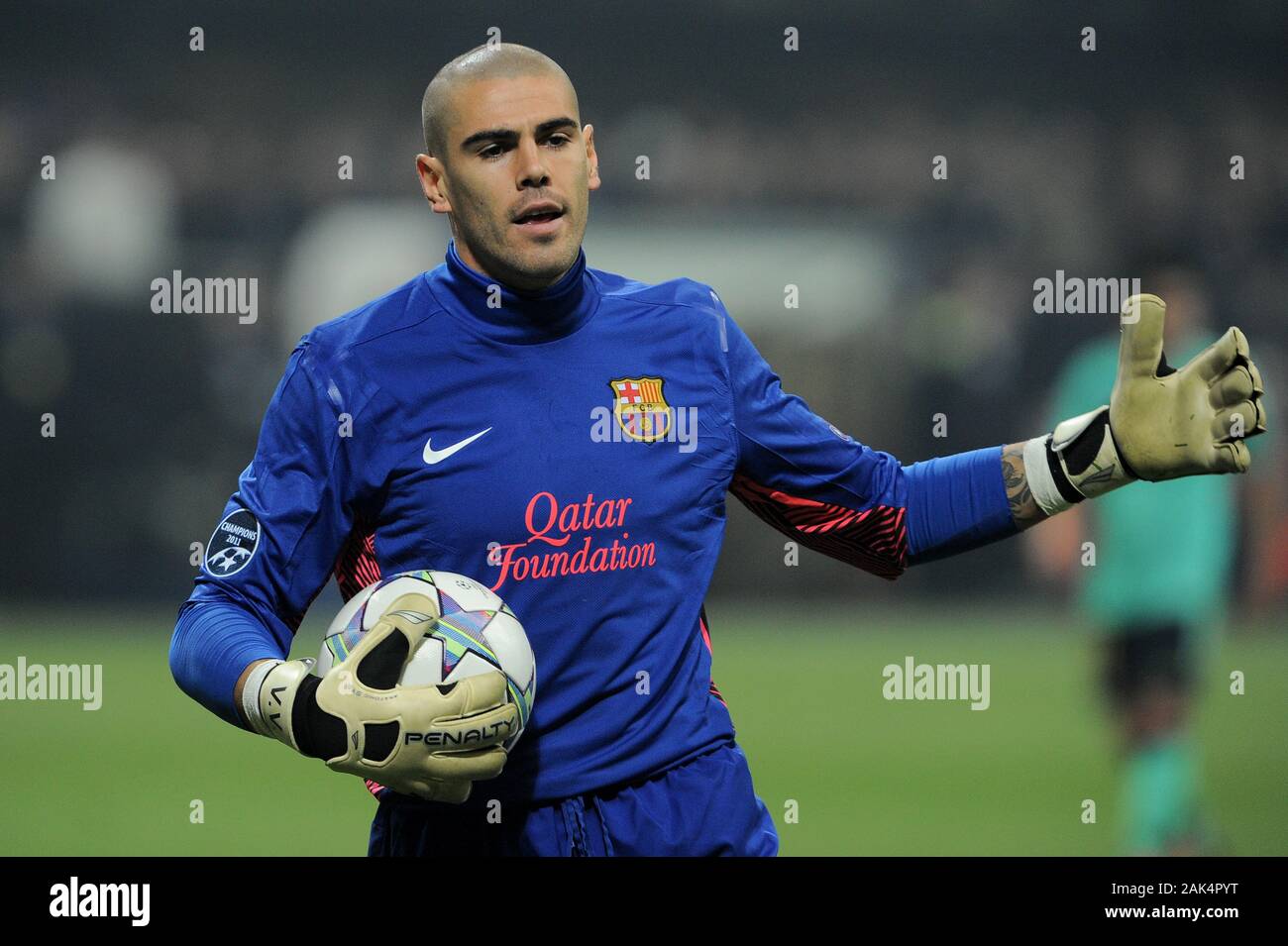 Milan Italy ,23 NOVEMBER 2011, 'G.Meazza  San Siro' Stadium, UEFA Champions League 2011/2012, AC Milan - FC Barcelona: Victor Valdes in action during the match Stock Photo