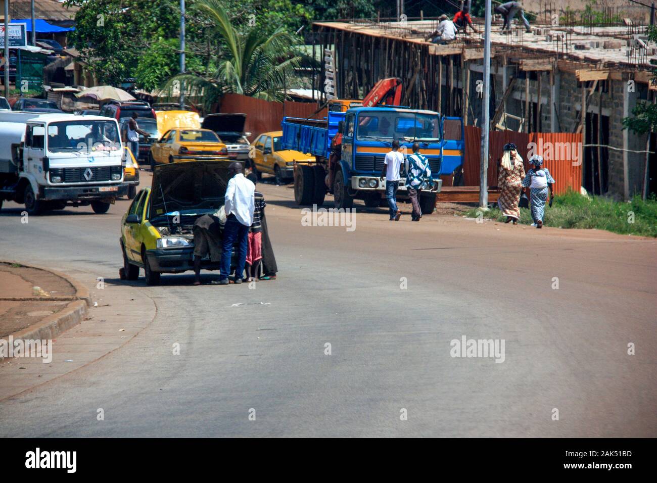 Car break down on the main street in Conakry, Guinea, West Africa Stock