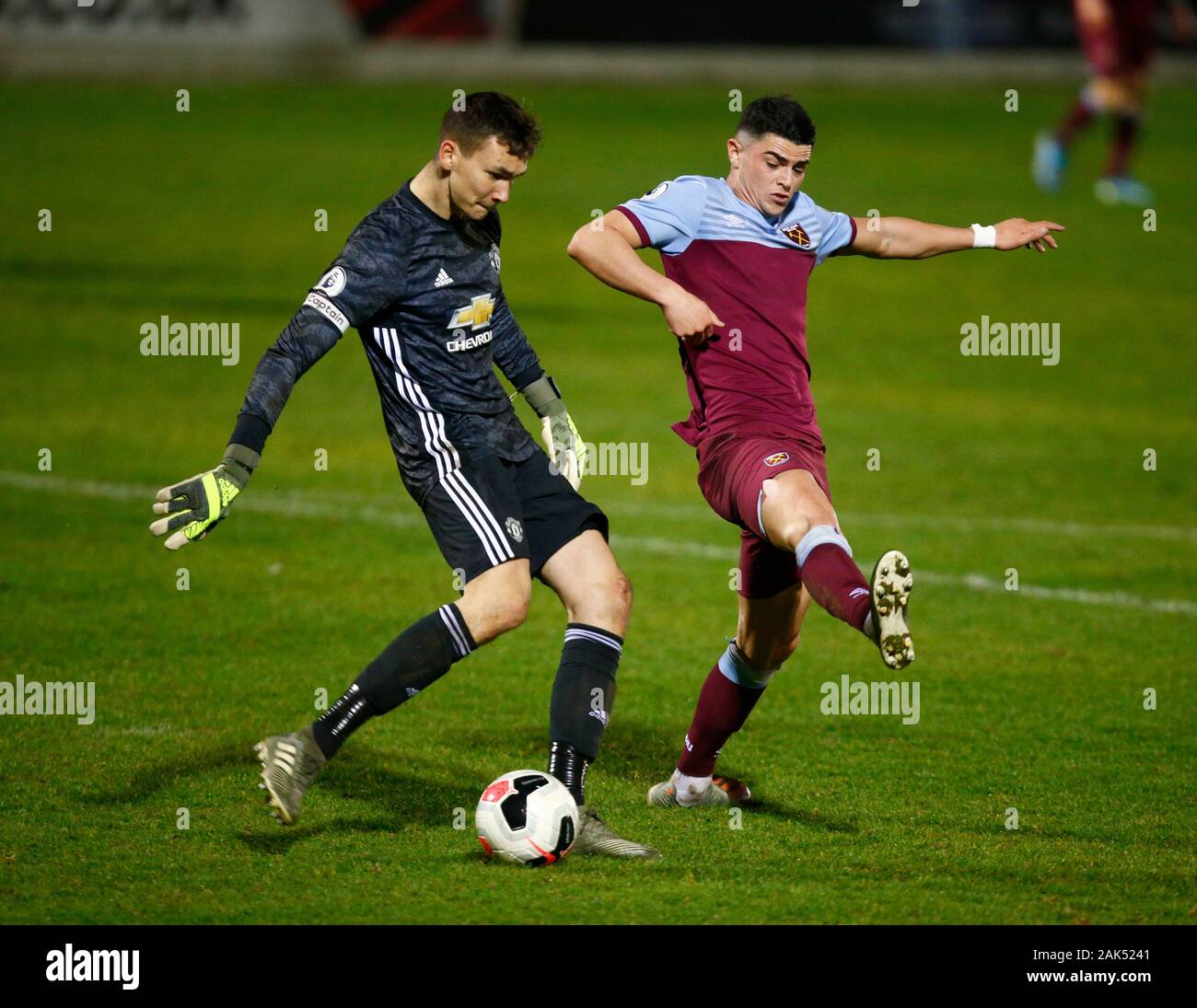 LONDON, ENGLAND. JANUARY 06: L-R Matej Kovar of Manchester United  and Joe Powell of West Ham United in action  during Premier League 2  match between Stock Photo