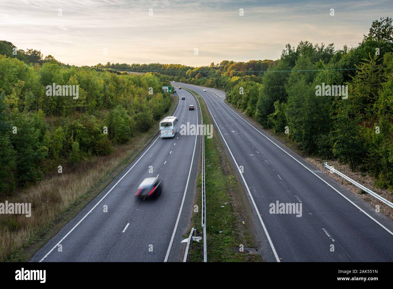 Tring, England, UK - September 14, 2019: Light traffic flows on the A41 dual carriageway near Tring in Hertfordshire in the London commuter belt. Stock Photo