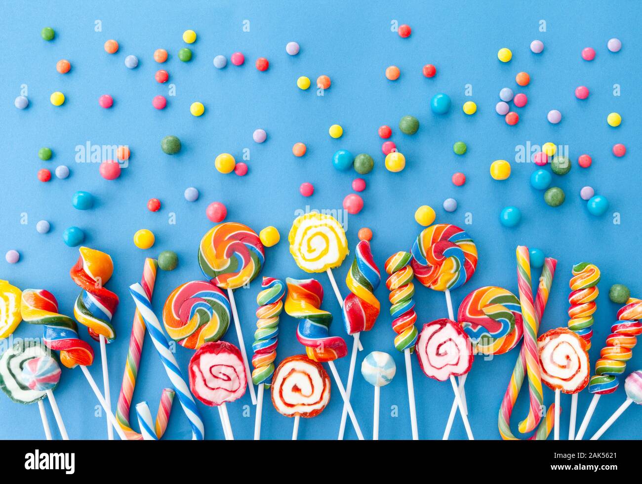 Colorful sweets and lollipops on a blue background Stock Photo