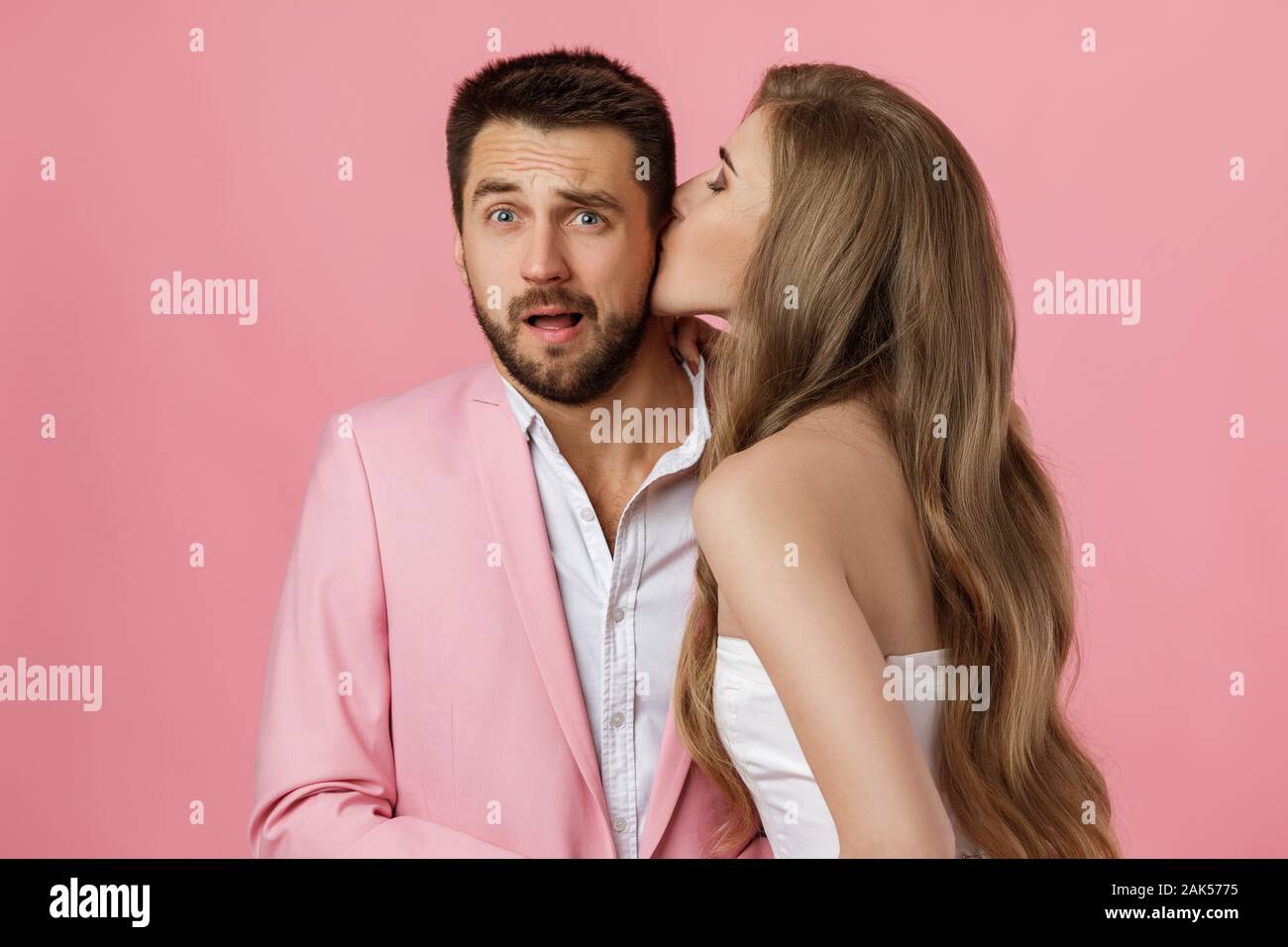 woman kissing her boyfriend. close-up. st valentines day. funny happy couple in love on pink background Stock Photo - Alamy woman kissing her boyfriend. close-up. st valentines day. funny happy couple in love on pink background Stock Photo - Alamy